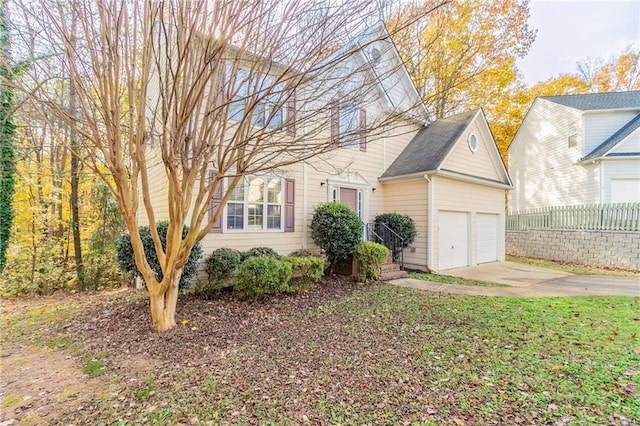 view of front of home with a garage