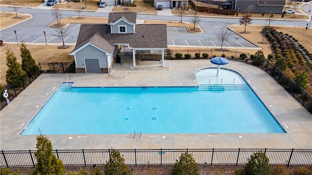 view of swimming pool with a patio area