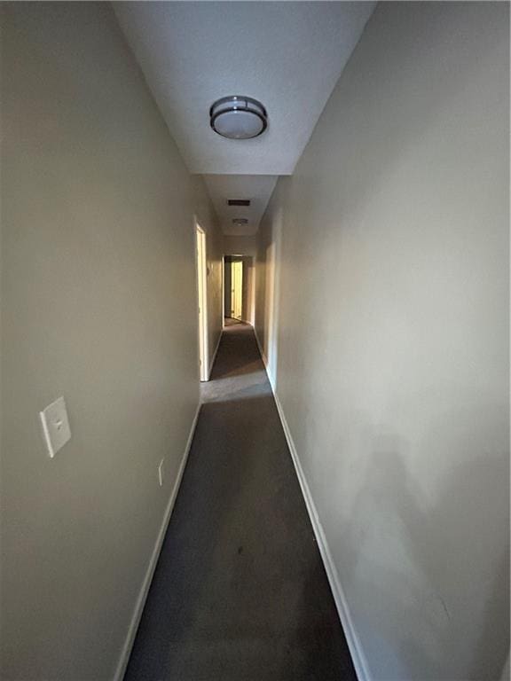 1182 Sims St SW, Atlanta, GA 30310 - corridor with baseboards and dark colored carpet