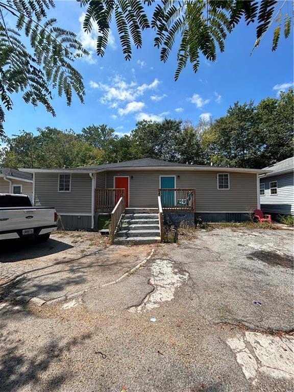 1182 Sims St SW, Atlanta, GA 30310 - manufactured / mobile home with a deck