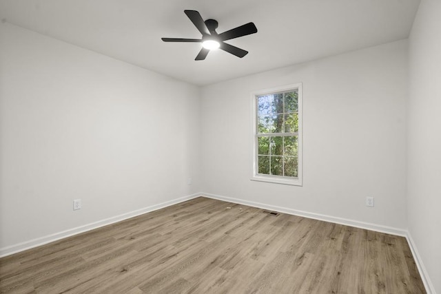 unfurnished room featuring ceiling fan and light hardwood / wood-style floors