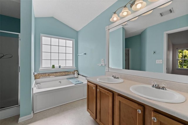 bathroom with a sink, visible vents, and a shower stall