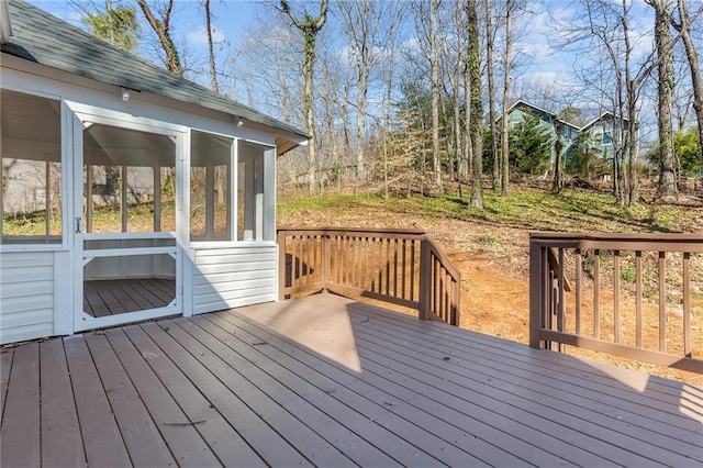 deck featuring a sunroom