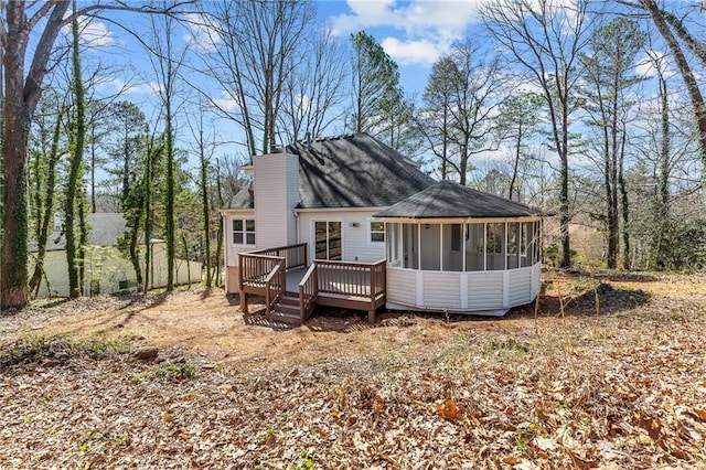 view of front of property featuring a deck and a sunroom