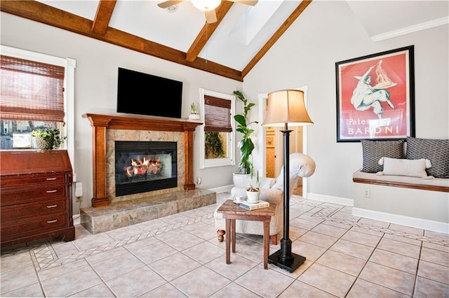 sitting room featuring light tile patterned flooring, high vaulted ceiling, beamed ceiling, a tiled fireplace, and ceiling fan