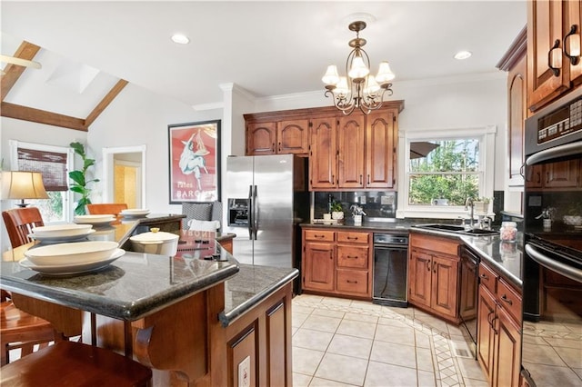 kitchen with sink, stainless steel fridge, dishwasher, a kitchen island, and decorative backsplash