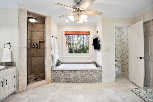 full bathroom with vanity, crown molding, toilet, and separate shower and tub