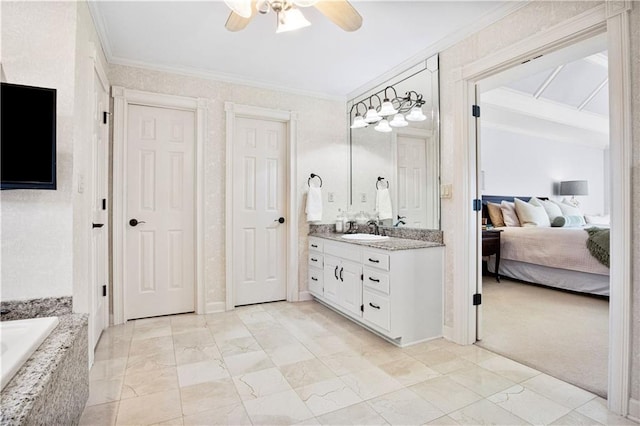 bathroom with ornamental molding, tiled bath, vanity, and ceiling fan