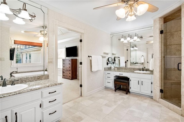 bathroom featuring an enclosed shower, vanity, crown molding, and ceiling fan