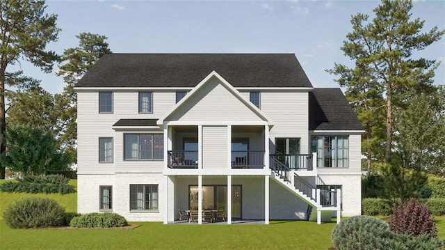 back of house featuring a balcony and a yard