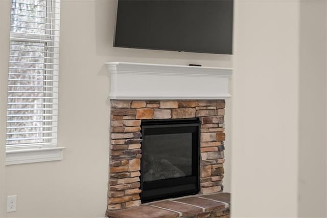 room details featuring a fireplace