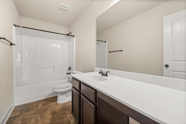 full bath with vanity, toilet, baseboards, shower / bathing tub combination, and visible vents