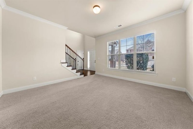 unfurnished living room with crown molding, carpet flooring, stairs, and baseboards