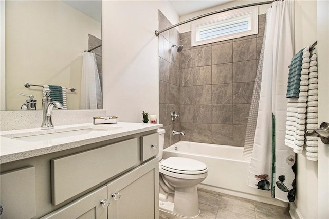full bathroom featuring vanity, shower / bathtub combination with curtain, tile patterned flooring, and toilet