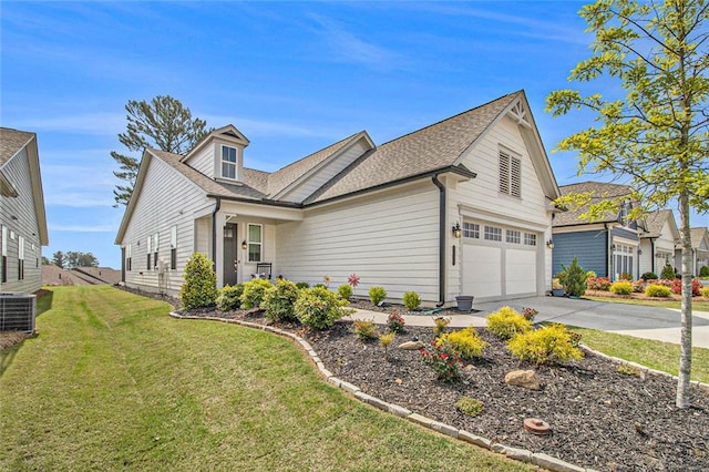 view of home's exterior featuring a lawn, roof with shingles, central air condition unit, and concrete driveway
