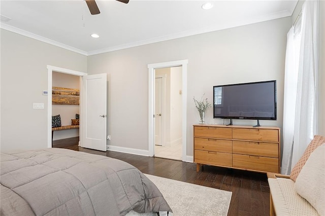 bedroom featuring dark wood-type flooring, ornamental molding, baseboards, and recessed lighting