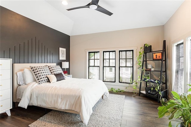 bedroom featuring high vaulted ceiling, ceiling fan, and wood finished floors
