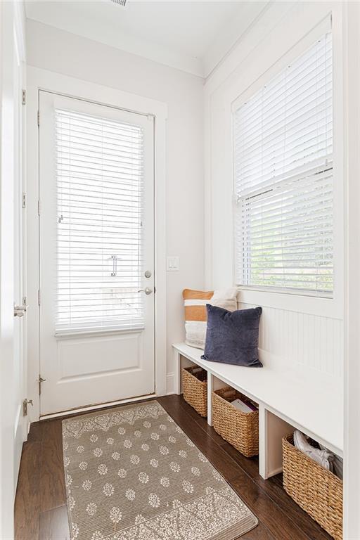 mudroom with wood finished floors