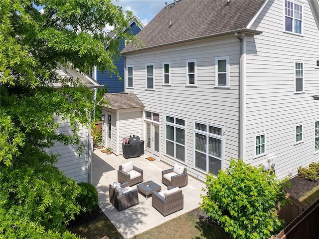 back of house with an outdoor hangout area, fence, a patio, and a shingled roof