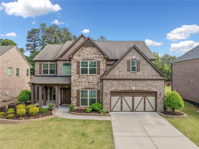 2435 Sentinel Chase Way, Cumming, GA 30041 - view of front of house featuring concrete driveway, a front lawn, stone siding, and brick siding