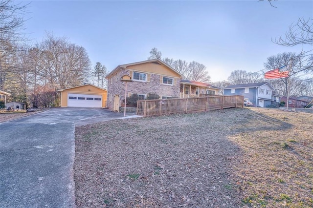 view of front of house featuring an outbuilding and a garage