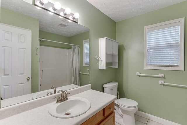 6485 Flowery Way, Flowery Branch, GA 30542 - bathroom featuring a textured ceiling, vanity, tile patterned flooring, toilet, and a shower with curtain