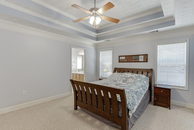 6485 Flowery Way, Flowery Branch, GA 30542 - bedroom with a tray ceiling, multiple windows, crown molding, and light carpet
