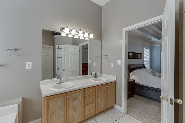6485 Flowery Way, Flowery Branch, GA 30542 - ensuite bathroom with double vanity, ornamental molding, baseboards, and tile patterned flooring