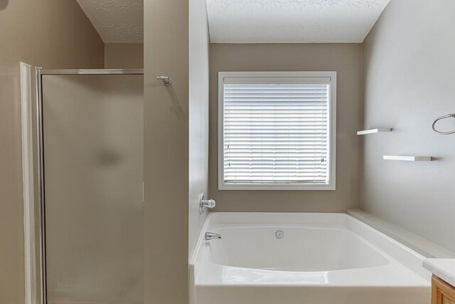6485 Flowery Way, Flowery Branch, GA 30542 - full bathroom with a stall shower, a bath, and vanity