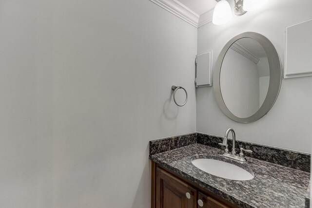 6485 Flowery Way, Flowery Branch, GA 30542 - bathroom featuring vanity and ornamental molding