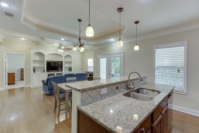 6485 Flowery Way, Flowery Branch, GA 30542 - kitchen featuring a sink, a ceiling fan, light wood finished floors, french doors, and ornamental molding