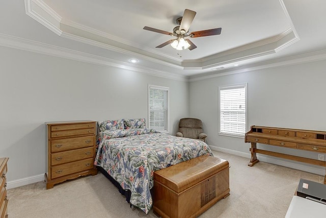6485 Flowery Way, Flowery Branch, GA 30542 - bedroom featuring light carpet, a tray ceiling, ornamental molding, a ceiling fan, and baseboards