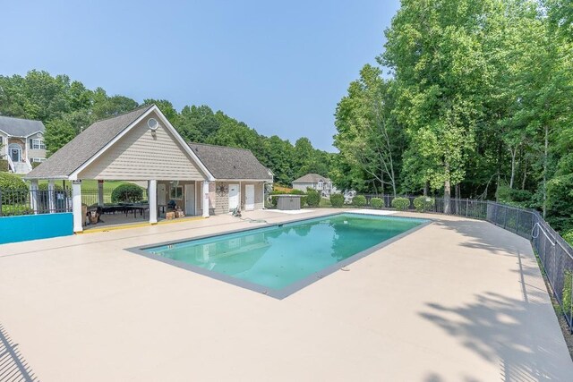 6485 Flowery Way, Flowery Branch, GA 30542 - view of swimming pool with a patio and view of scattered trees