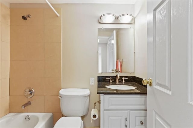 full bathroom with vanity, toilet, and tiled shower / bath combo