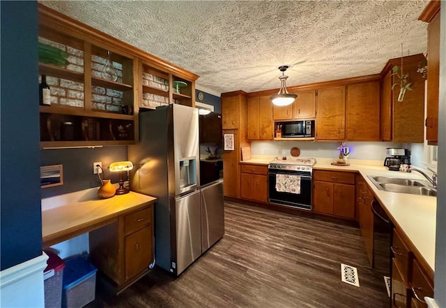 4114 Falcon Shores Ct NW, Acworth, GA 30101 - kitchen featuring black appliances, brown cabinetry, open shelves, dark wood-style floors, and light countertops