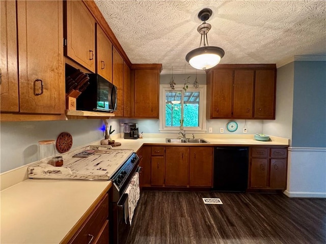 4114 Falcon Shores Ct NW, Acworth, GA 30101 - kitchen featuring black appliances, light countertops, dark wood-style floors, brown cabinetry, and a textured ceiling