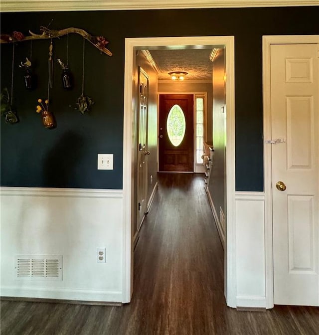 4114 Falcon Shores Ct NW, Acworth, GA 30101 - entryway featuring ornamental molding and dark wood-style floors