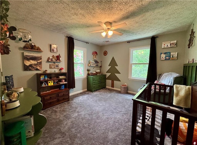 4114 Falcon Shores Ct NW, Acworth, GA 30101 - bedroom with multiple windows, a textured ceiling, carpet flooring, and a ceiling fan