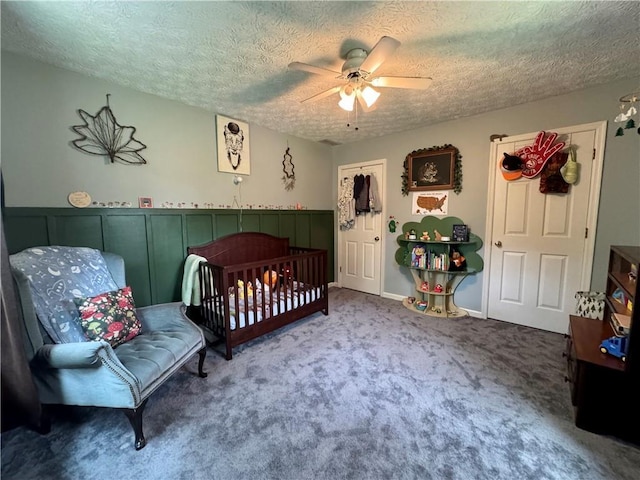 4114 Falcon Shores Ct NW, Acworth, GA 30101 - bedroom with a textured ceiling, carpet flooring, and a ceiling fan