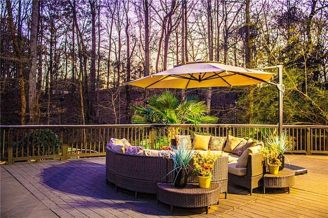 wooden terrace with outdoor lounge area