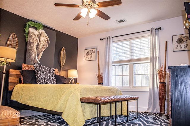 bedroom featuring ceiling fan