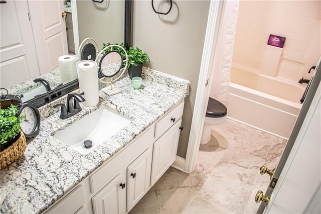 full bathroom featuring vanity, shower / bath combo, and toilet