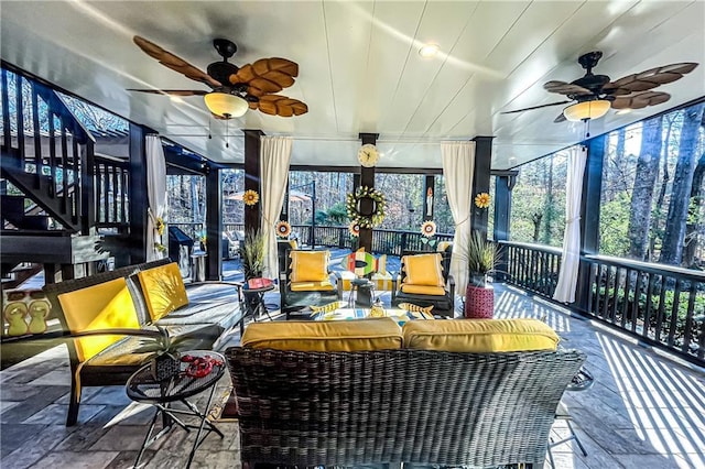 sunroom / solarium featuring wood ceiling