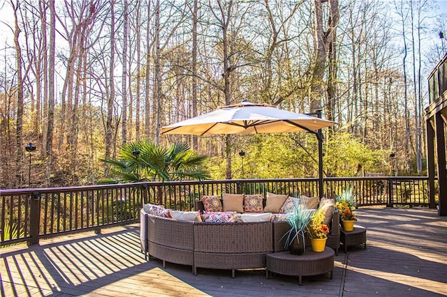 wooden deck with outdoor lounge area