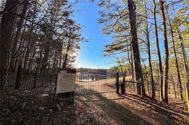 view of gate featuring a water view