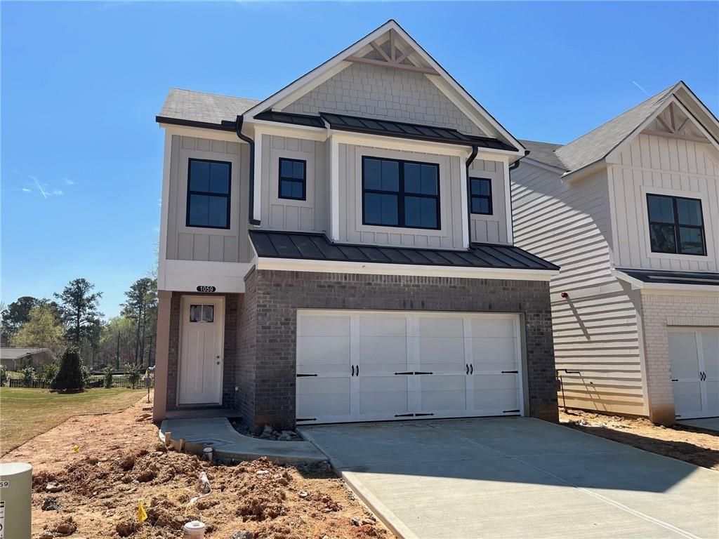 view of front of home featuring a garage