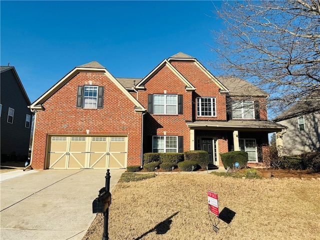 view of front of property with a garage