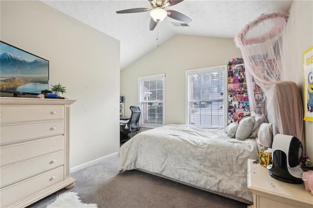 bedroom with visible vents, carpet flooring, a textured ceiling, and vaulted ceiling