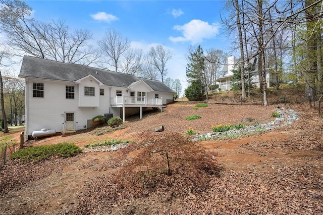 back of house featuring central AC