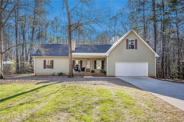 view of front of home featuring covered porch, concrete driveway, a front lawn, and a chimney